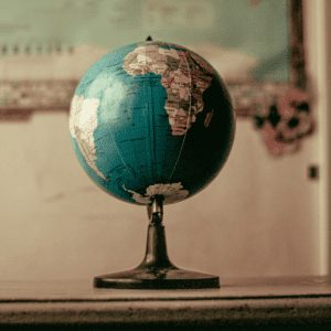A globe kept on a table, signifying changing the world.