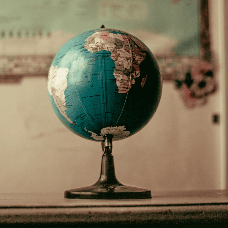 A globe kept on a table, signifying changing the world.